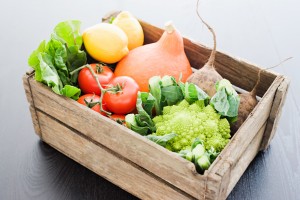 Wooden crate of fresh vegetables